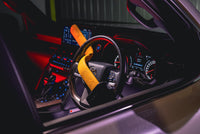Stoplock Pro Elite steering wheel lock secured in position across the wheel rim